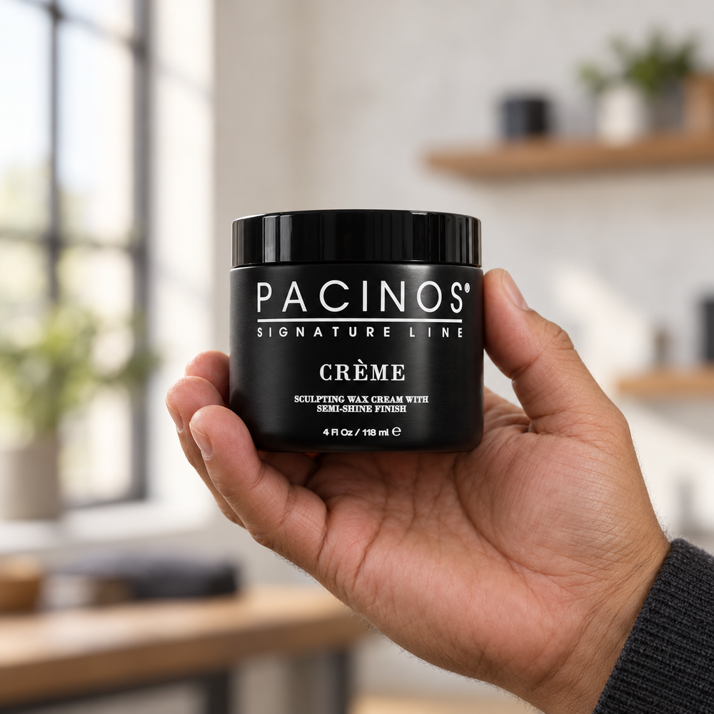 Pacinos Creme sculpting wax cream 4 oz jar held in a man's hand to show its size