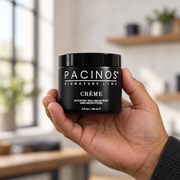 Pacinos Creme sculpting wax cream 4 oz jar held in a man's hand to show its size